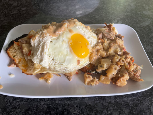 Sausage with Gravy and Egg on Sourdough